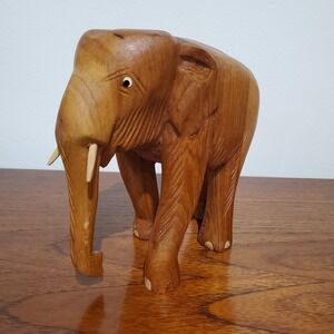 hand carved wooden‎ elephant with tusks, 6.5 in tall, figurine